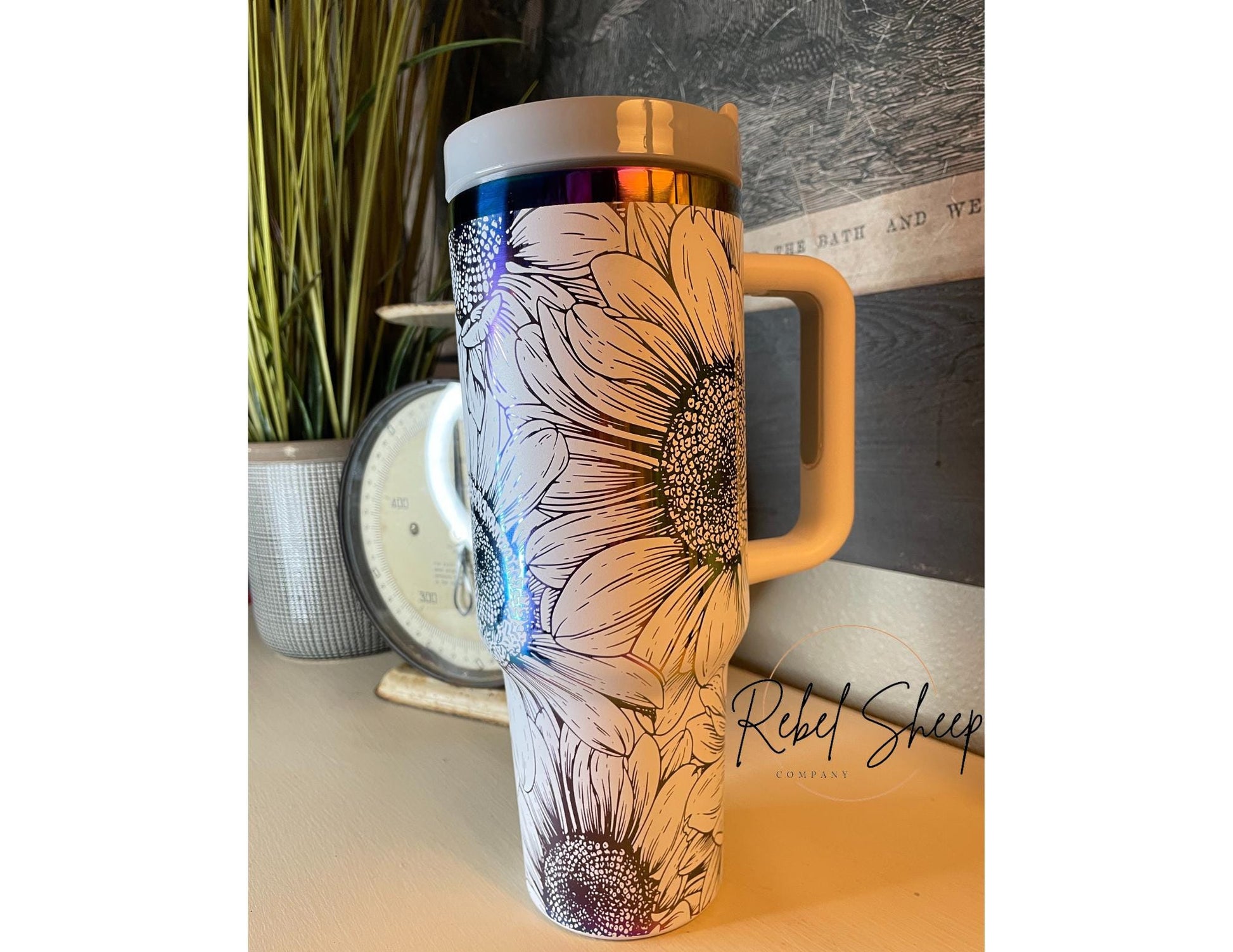 40 oz. Tumbler with Handle Laser Engraved with Sunflowers White on Rainbow